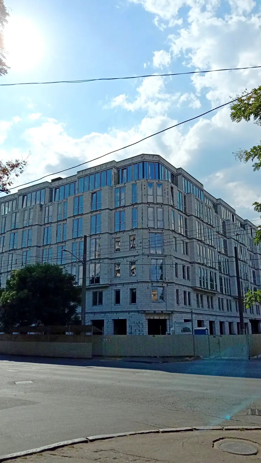 Отделка фасада доходного дома Salve — фото строительства