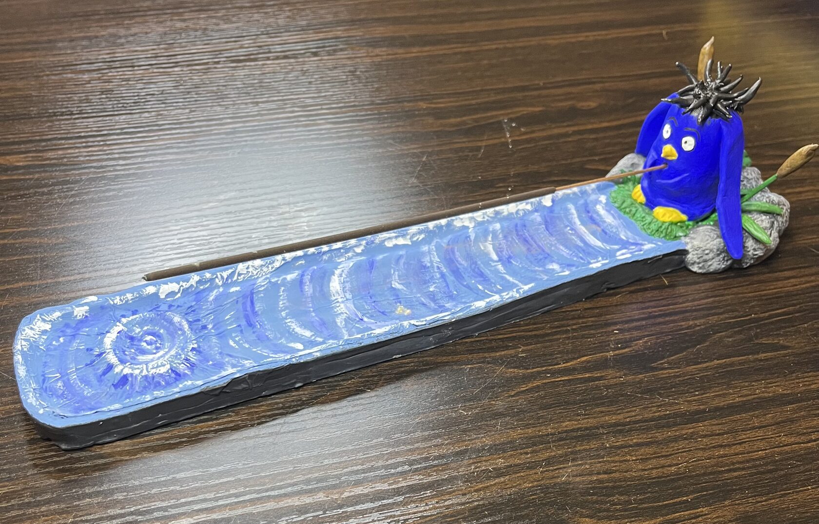 A Soul’s Familiar: the complete blue clay companion and long incense tray, photographed on a wooden surface.