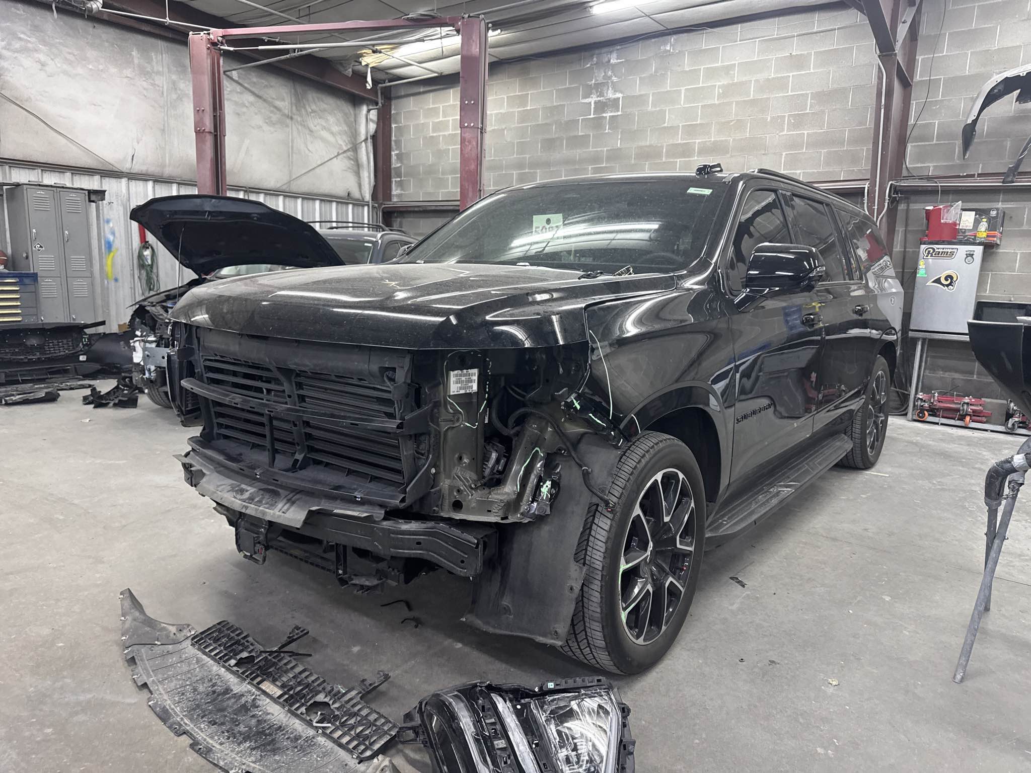 Vehicle undergoing collision repair at Green Tech Auto Body