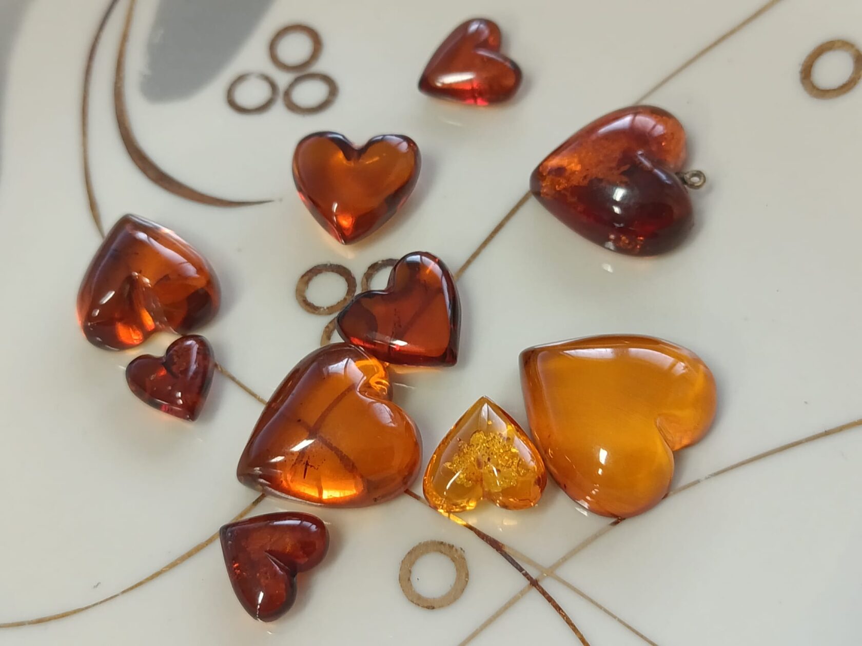 Small honey amber heart talismans