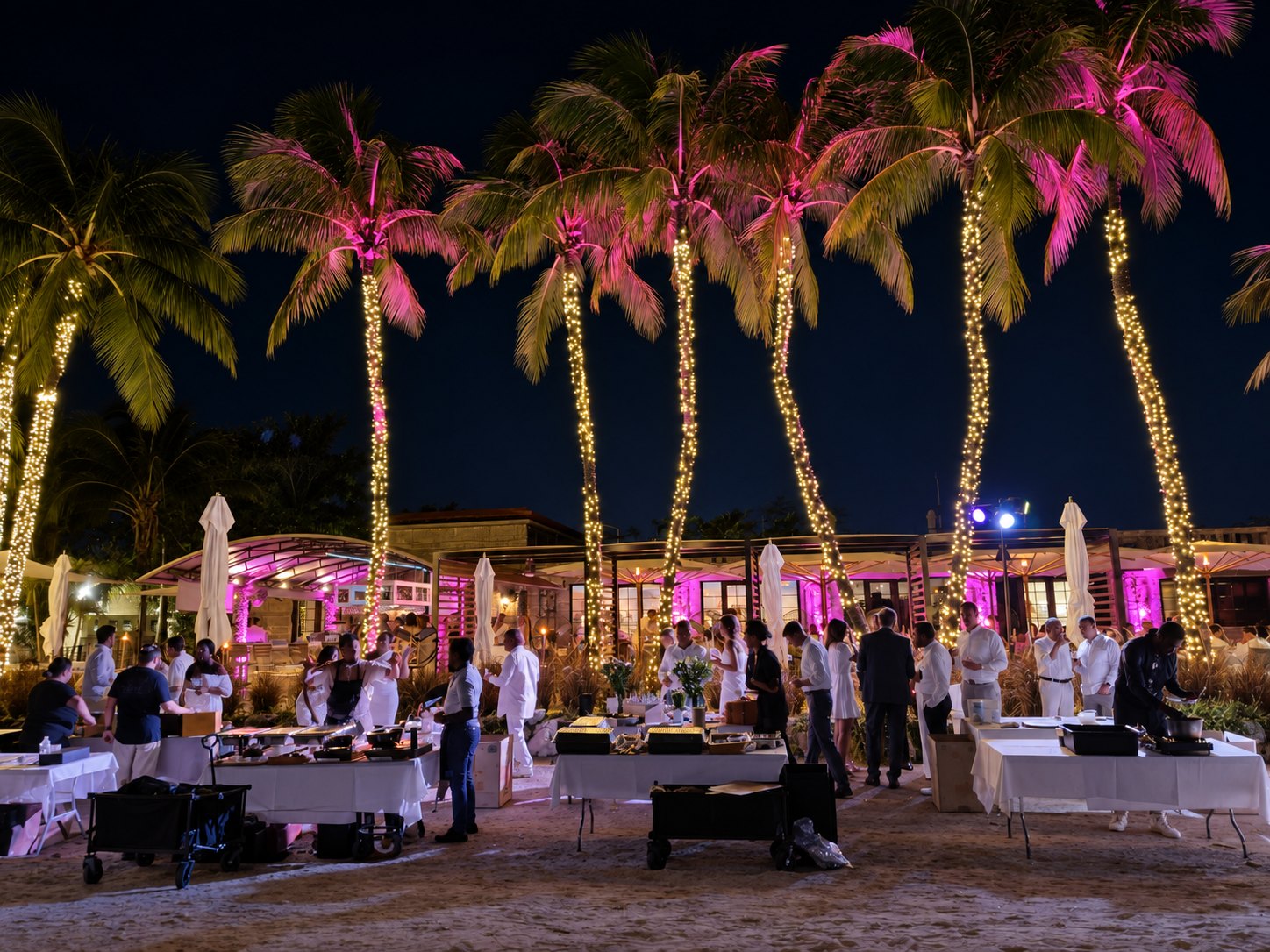 Palm trees wrapped in string lights at Noma Beach at Redfish in Coral Gables, the venue of the March of Dimes Signature Chefs gala