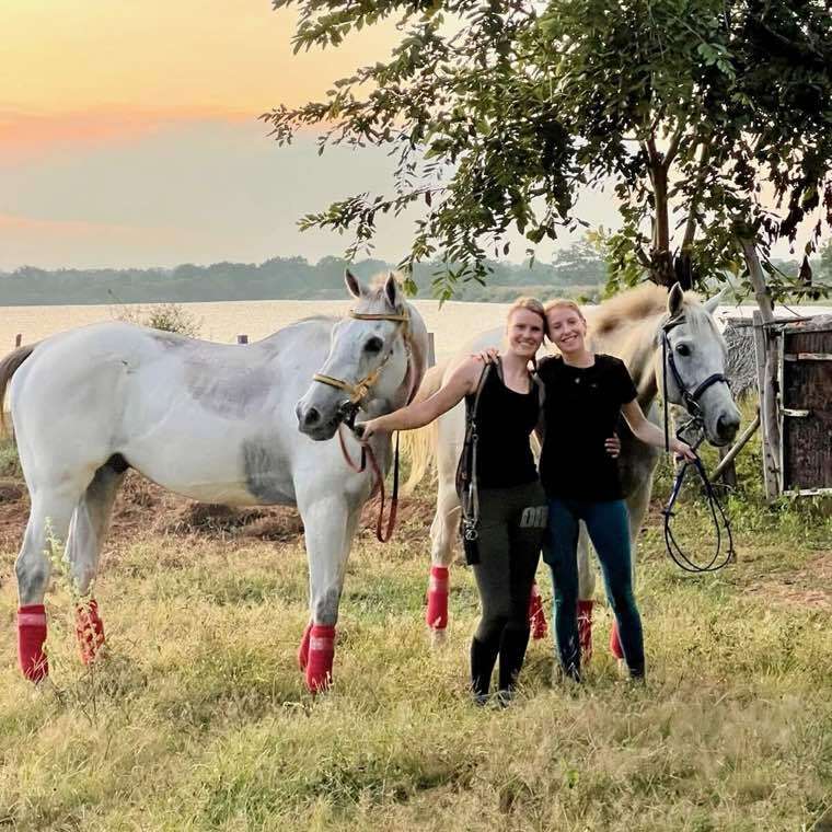 Riders resting by the lake after a private horseback ride at Vonfidel Ranch in Sri Lanka.