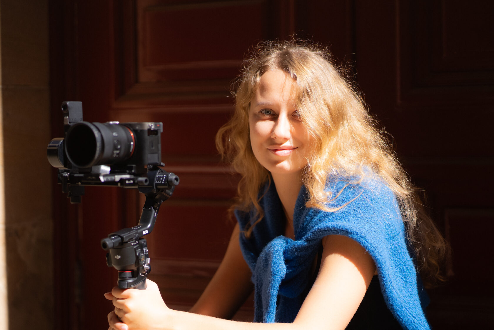 Filmmaker behind the camera on location