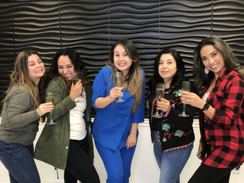 Graduation day: students celebrating with champagne