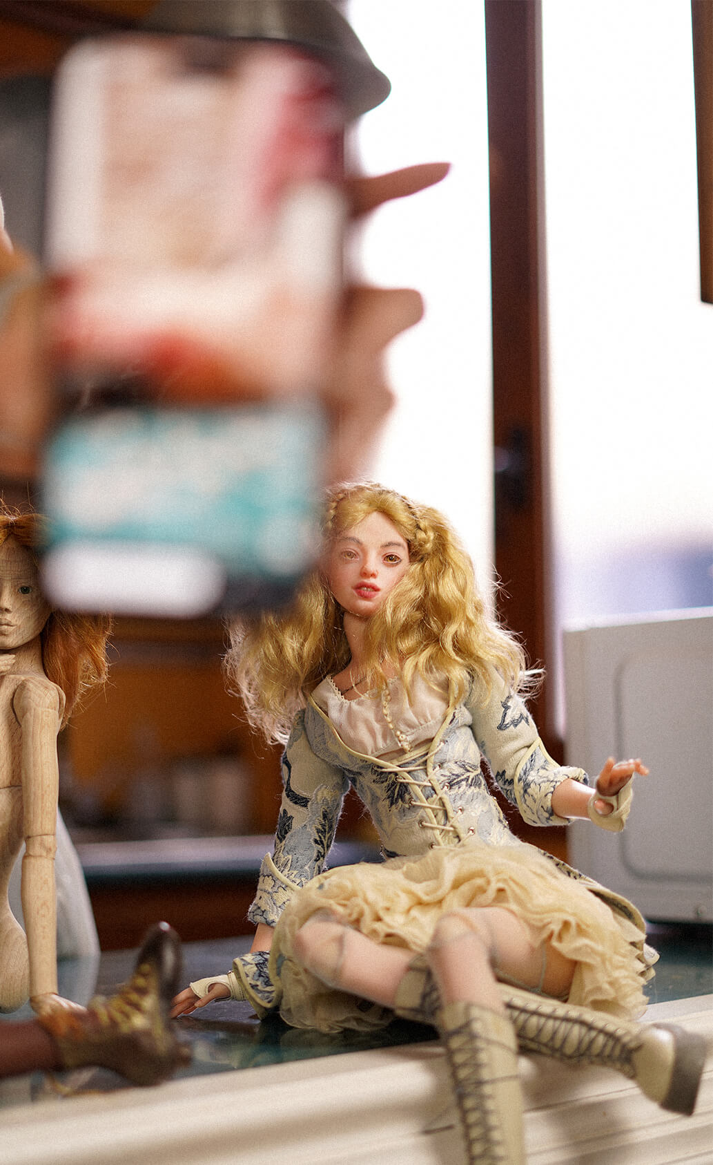 Anna Haritonova, doll artist, on a Barcelona rooftop with her ball-jointed dolls