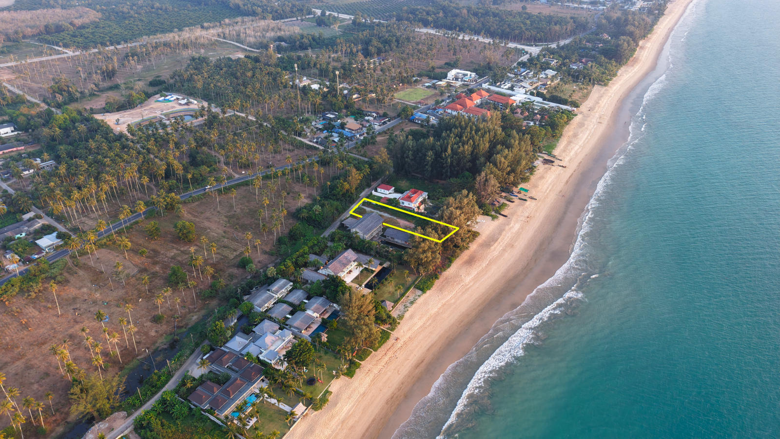 Aerial view of the 30-metre beachfront plot, Natai Beach