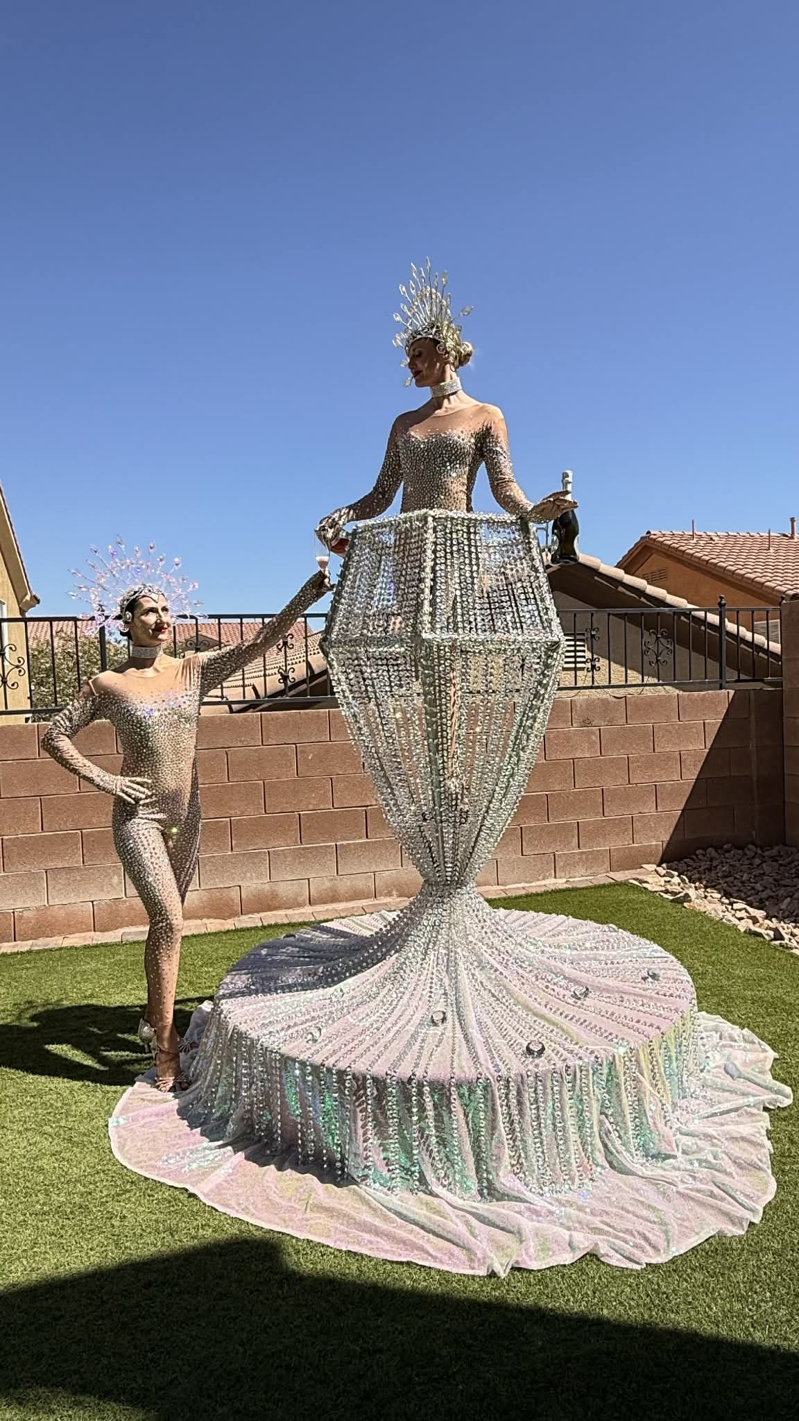 Performers in crystal costumes with the Diamond Pour prop