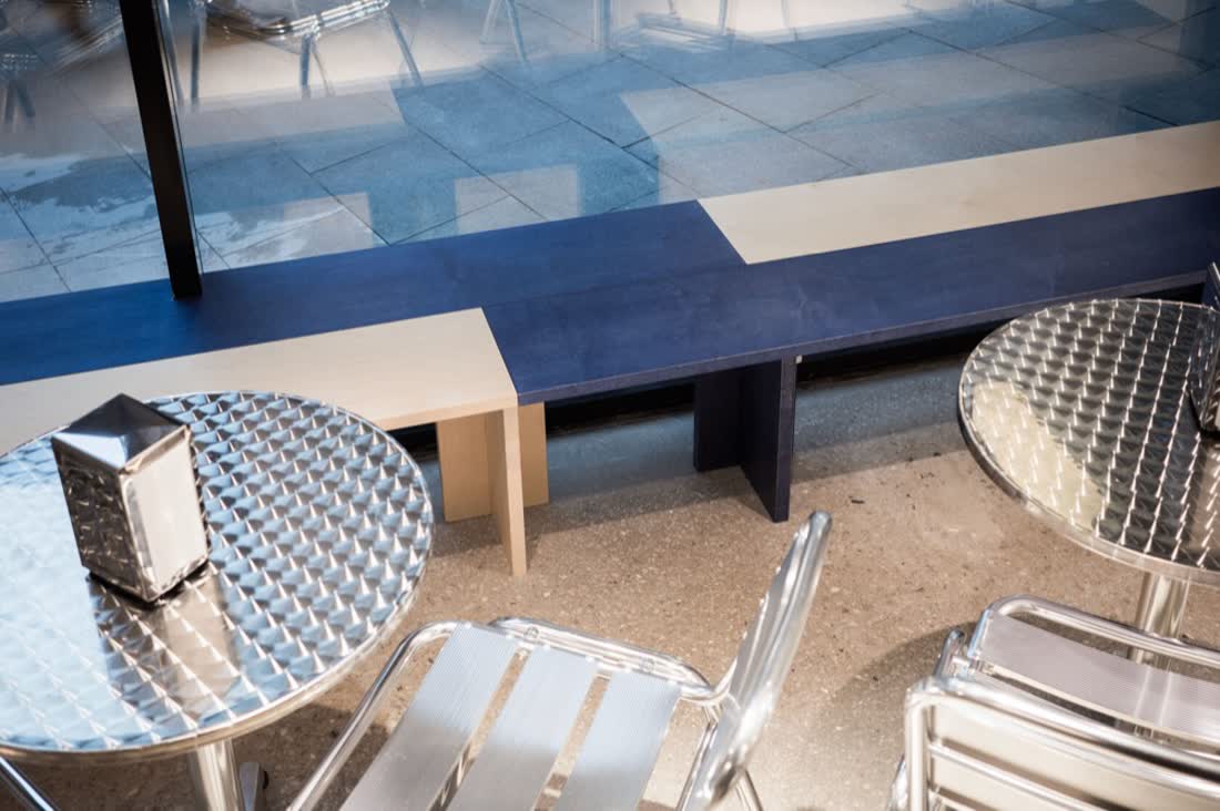 Blue counter with round tables