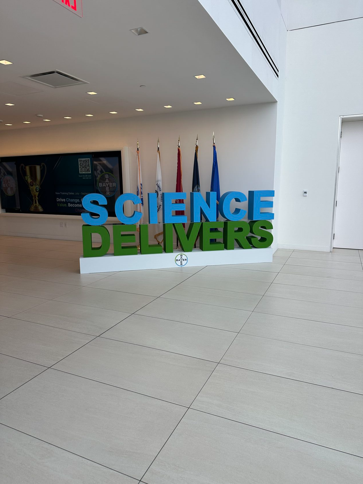 Custom 10-foot Bayer foam logo installed in Whippany New Jersey