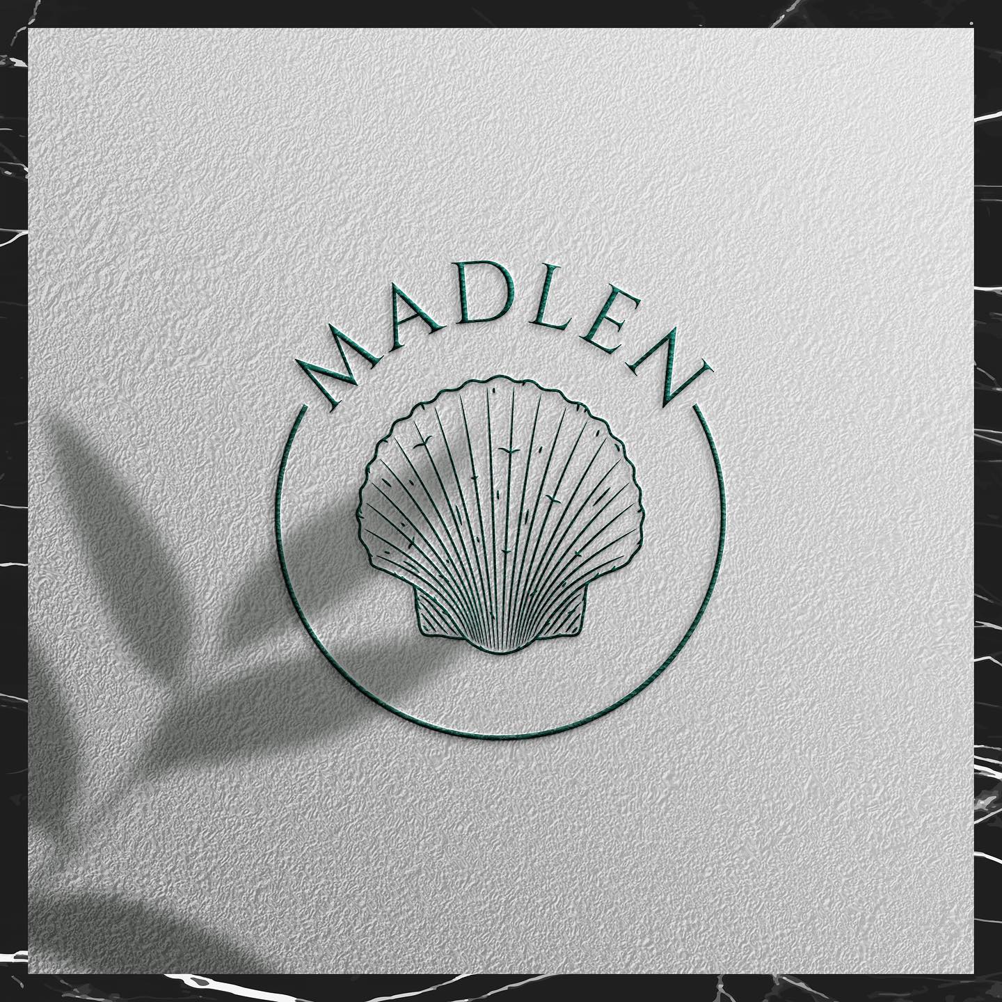 Madlen bakery logo in Odesa – a shell in a circle