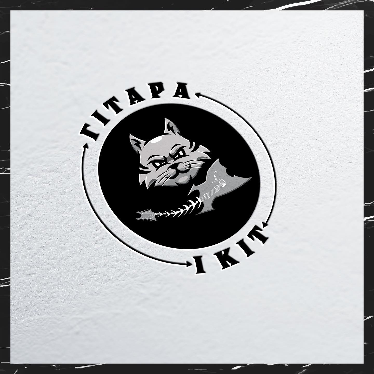 Hitara i Kit guitar store logo – a cat with a guitar