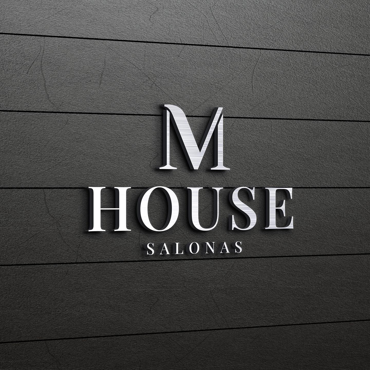 M HOUSE salonas beauty salon logo on a dark wall
