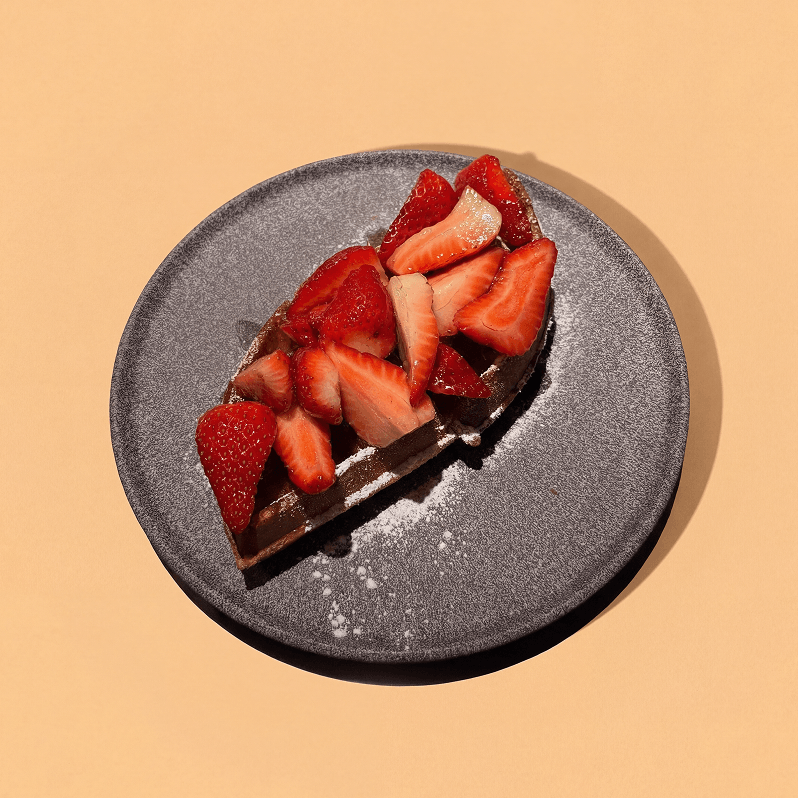 Strawberry waffle with fresh strawberries