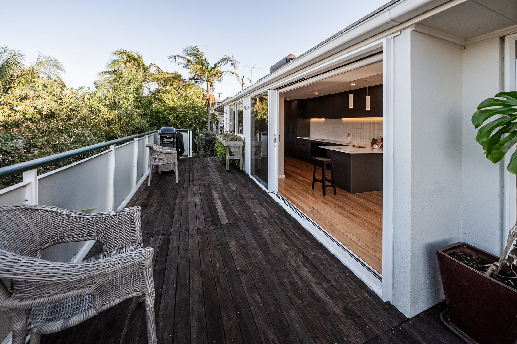 Outdoor deck running beside the renovated Glenfield kitchen and living area