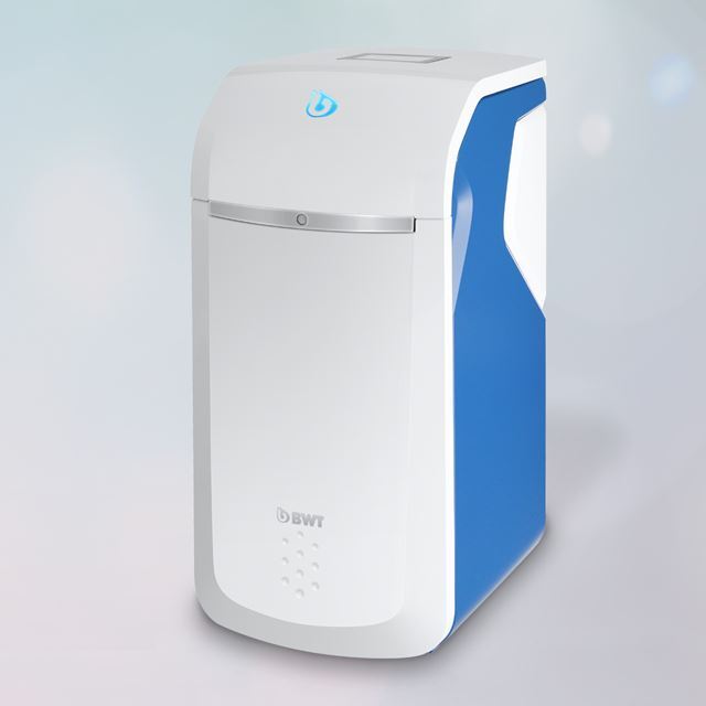The image shows a BWT water softener, a compact device designed to reduce water hardness by removing calcium and magnesium ions