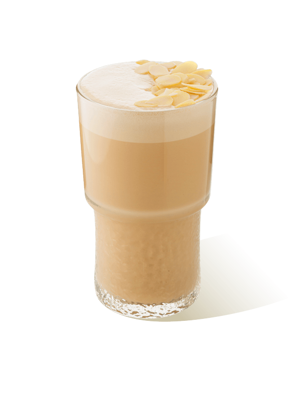 Raf coffee in a glass topped with milk foam and almond slices, made using The Base Beverage signature powder mix