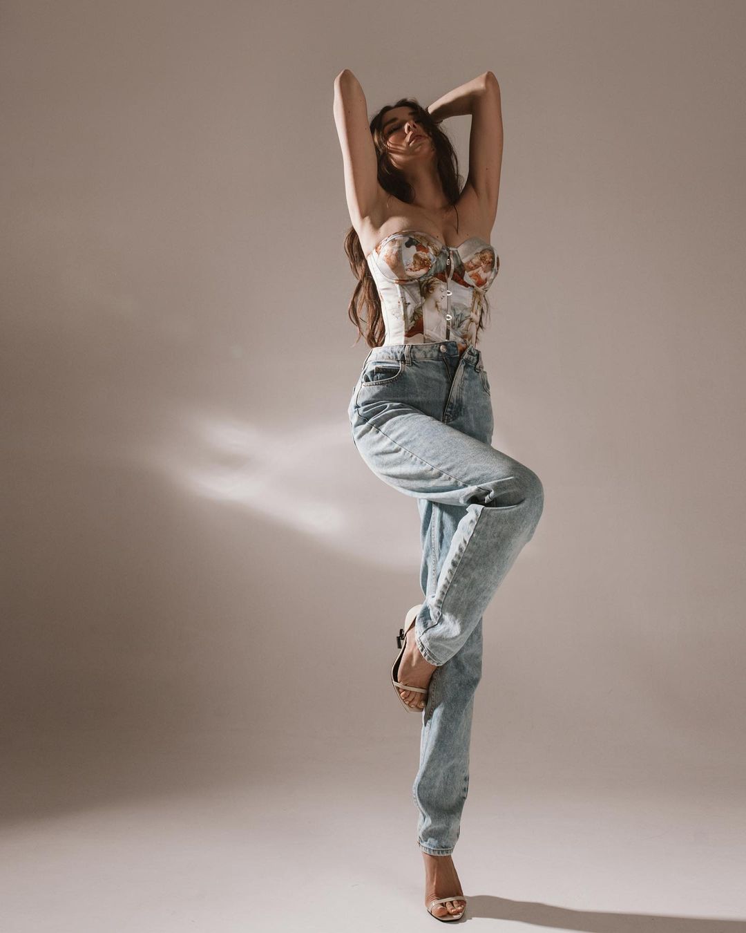 woman in sain corset