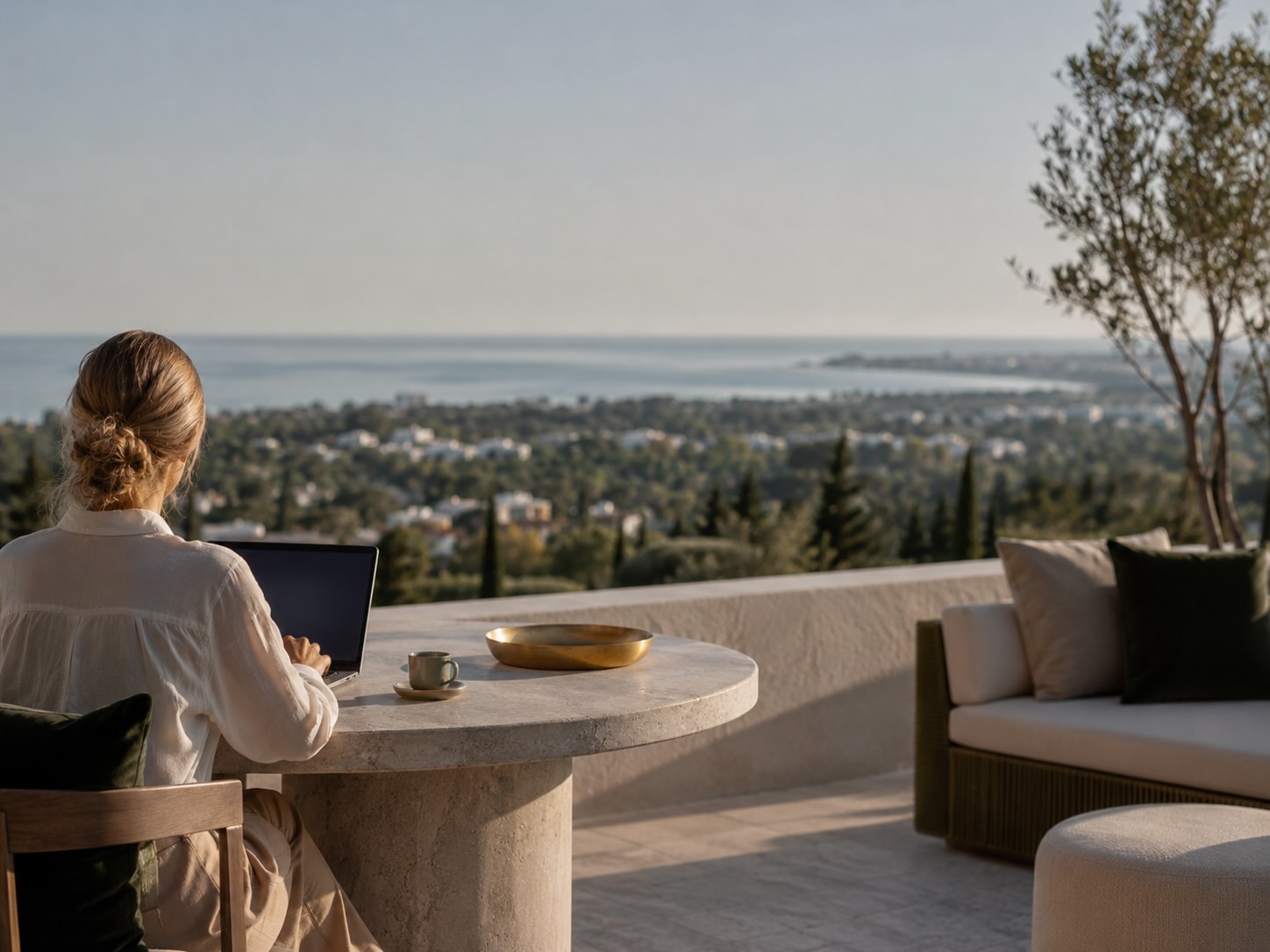 Remote worker on a penthouse terrace with sea views in Nueva Andalucía