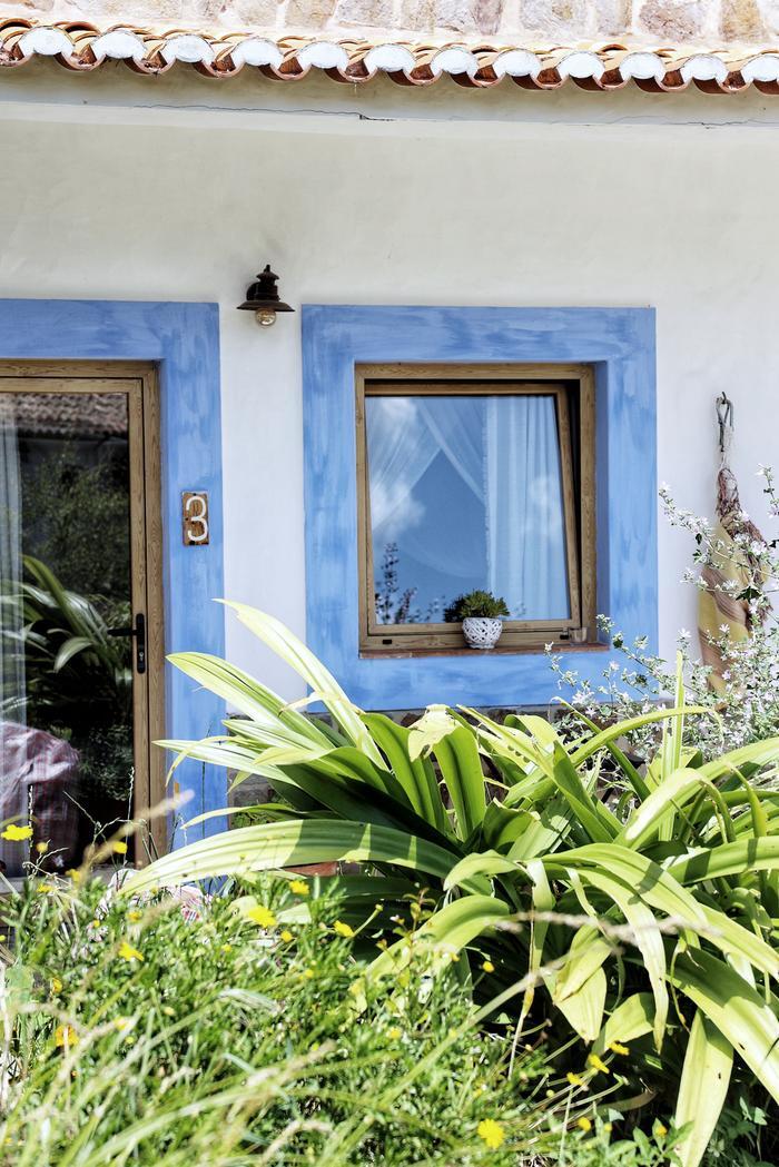A Garden Suite entrance, painted blue