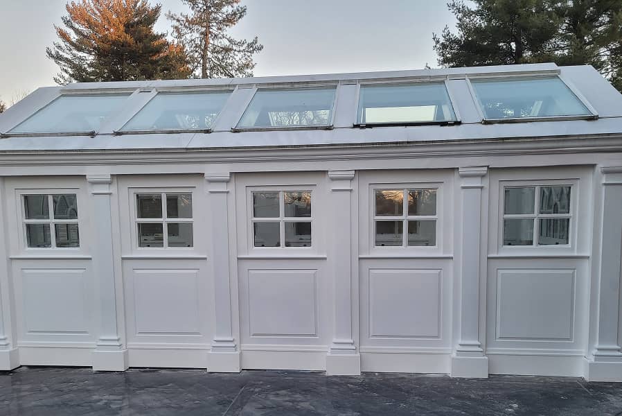 Sun room with traditional panels and pilasters 