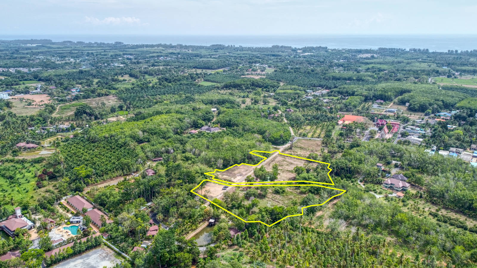 Aerial view of the 12.75 rai plot, near Natai Beach
