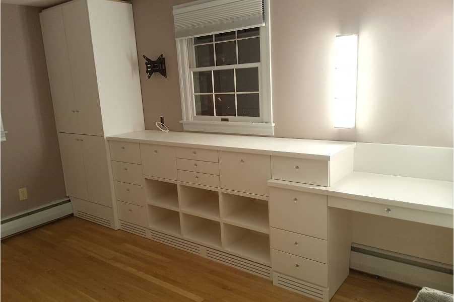 Dressing room storage cabinets with make up table and cubbies