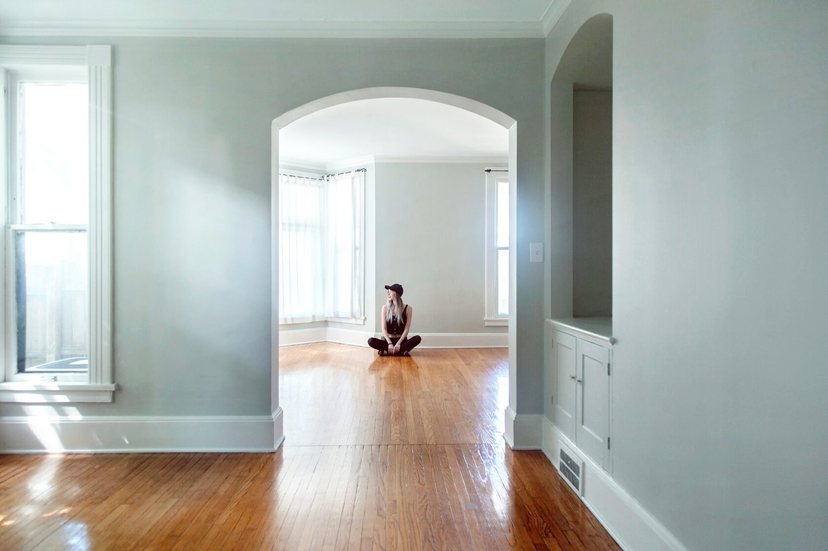 Living room before renovation, 2023 — dim, north-facing, half the square footage in storage