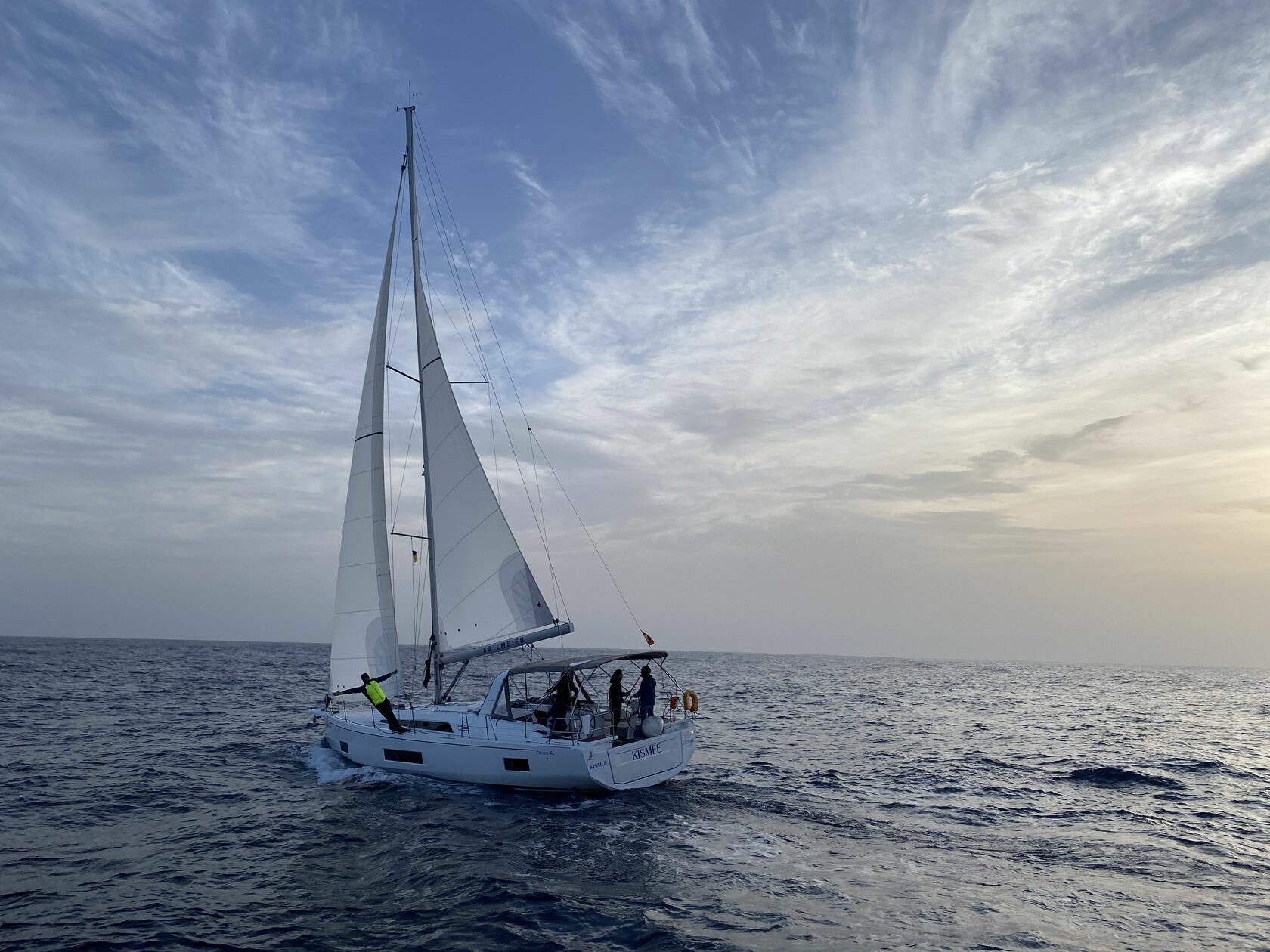 Monohull yacht under full sail