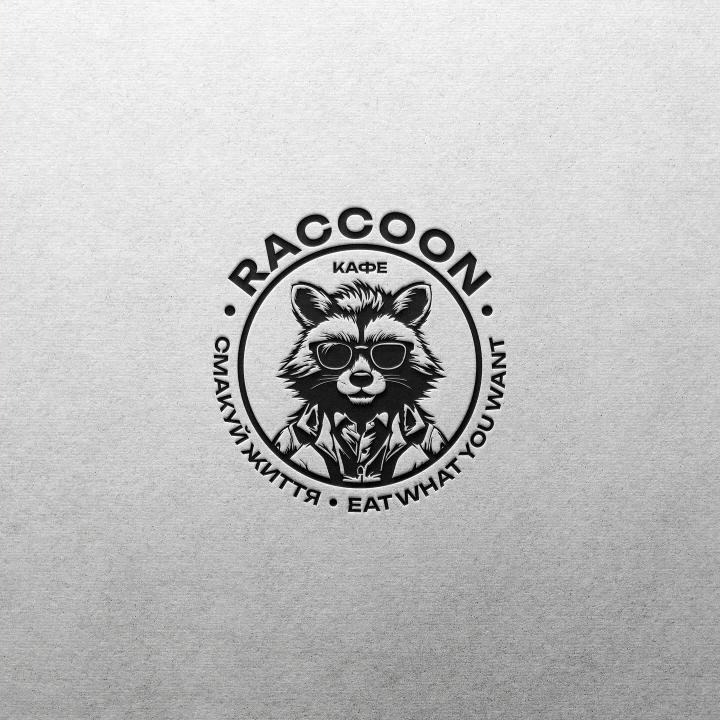 RACCOON café logo embossed on paper