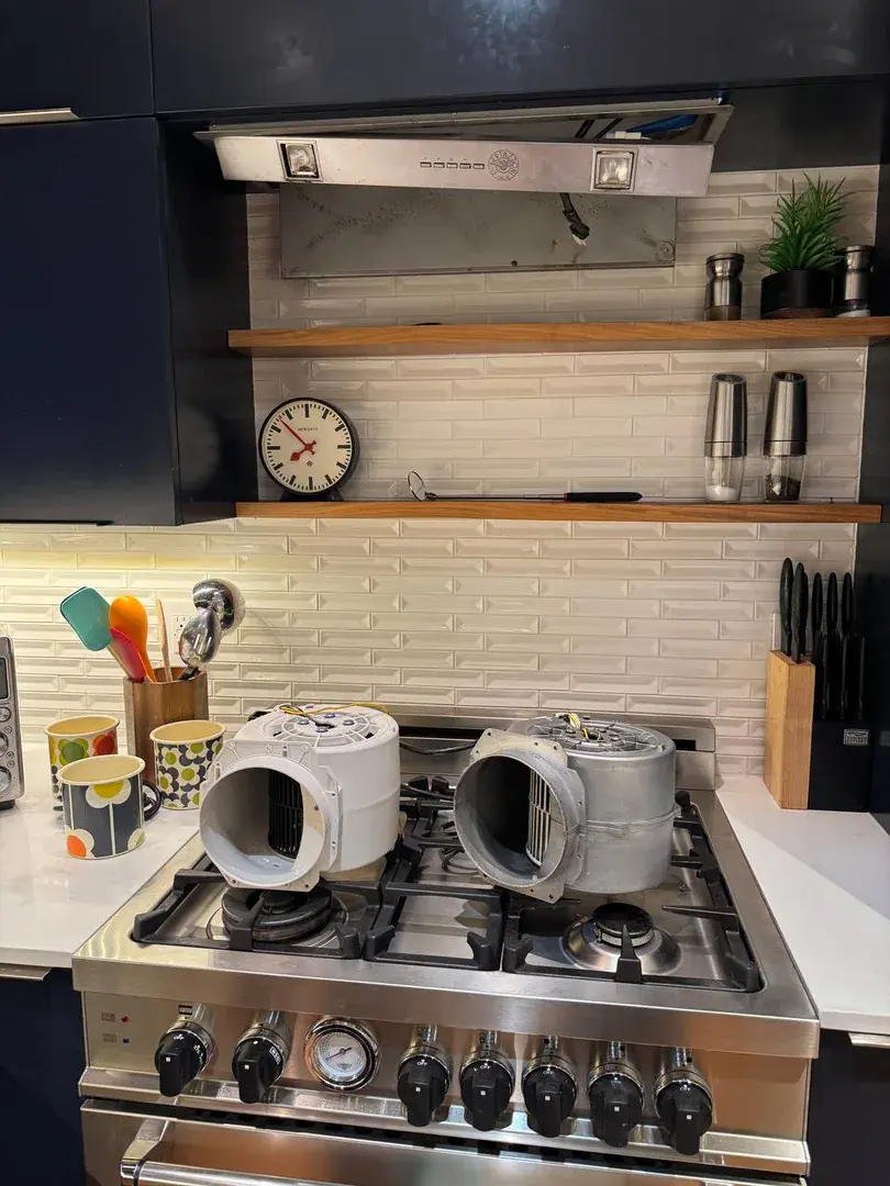 Technician repairing an appliance