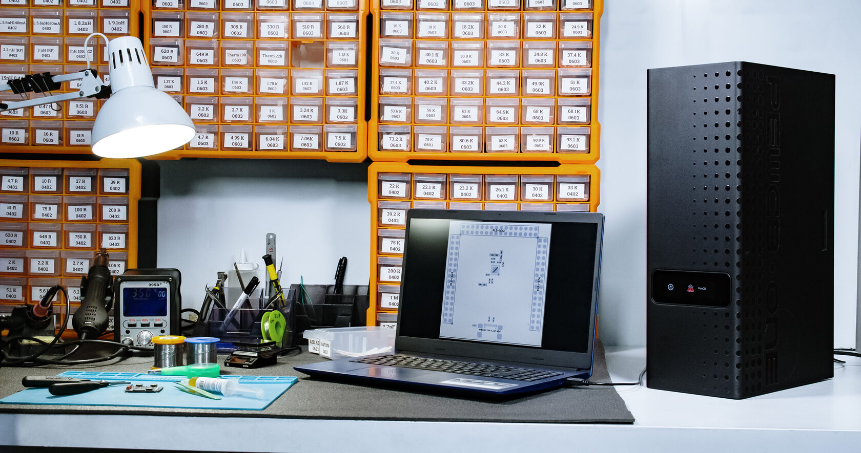 PewCB One desktop prototyping system in an electronics workshop