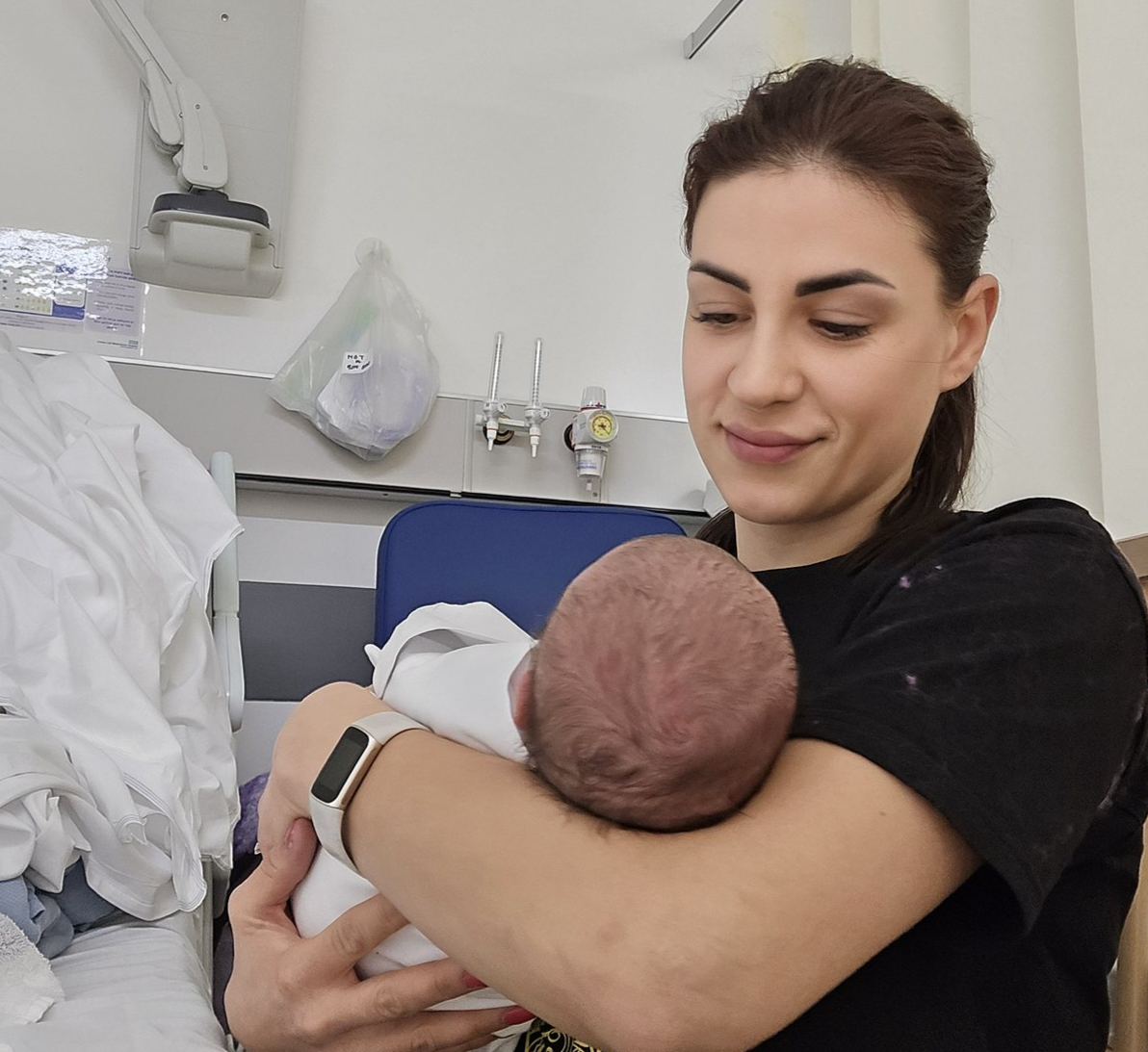 Valentina with a newborn in hospital