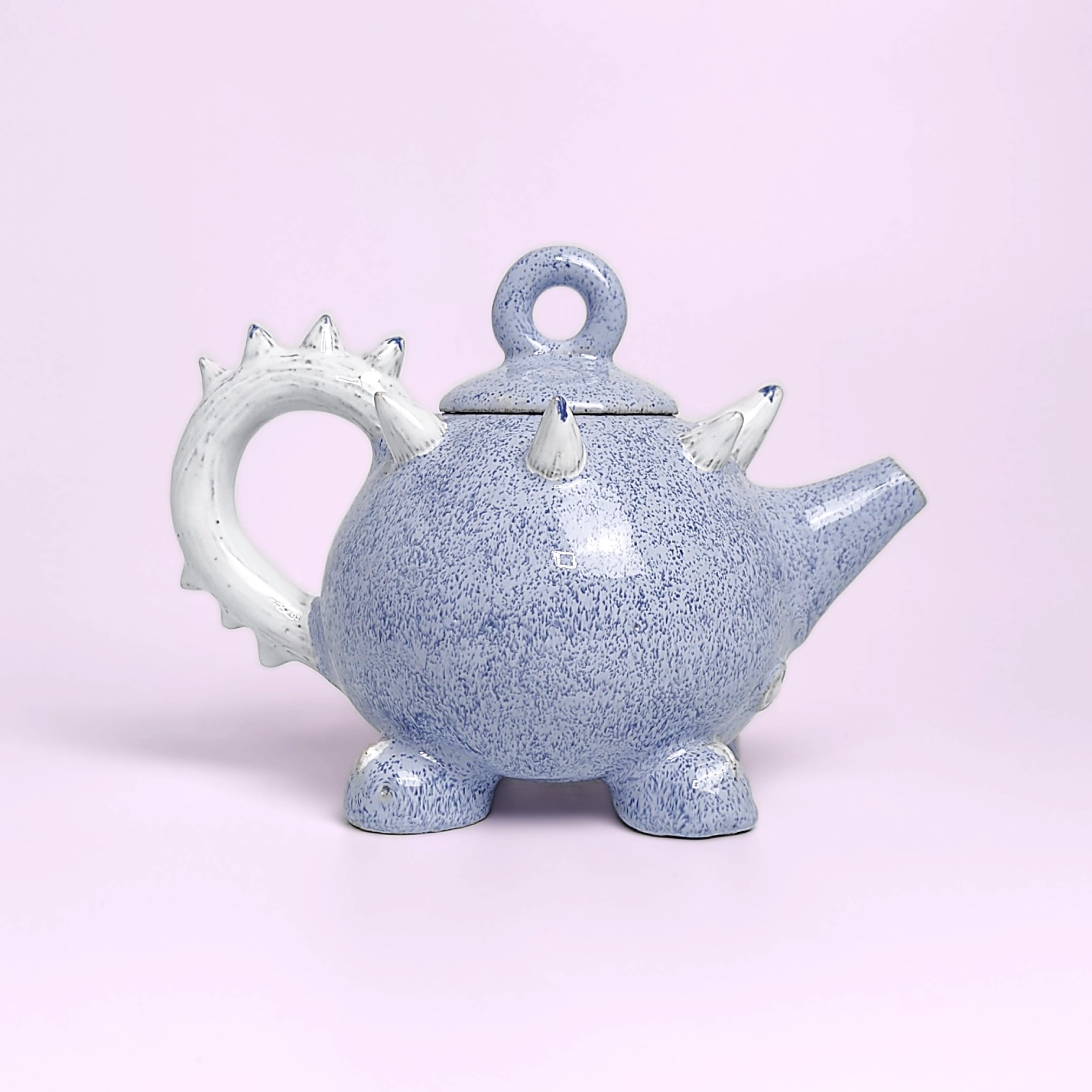 Unique handmade fairy-tale ceramic tea set shaped like a whimsical crystal-covered little monster, featuring a sculptural teapot and two matching cups with saucers