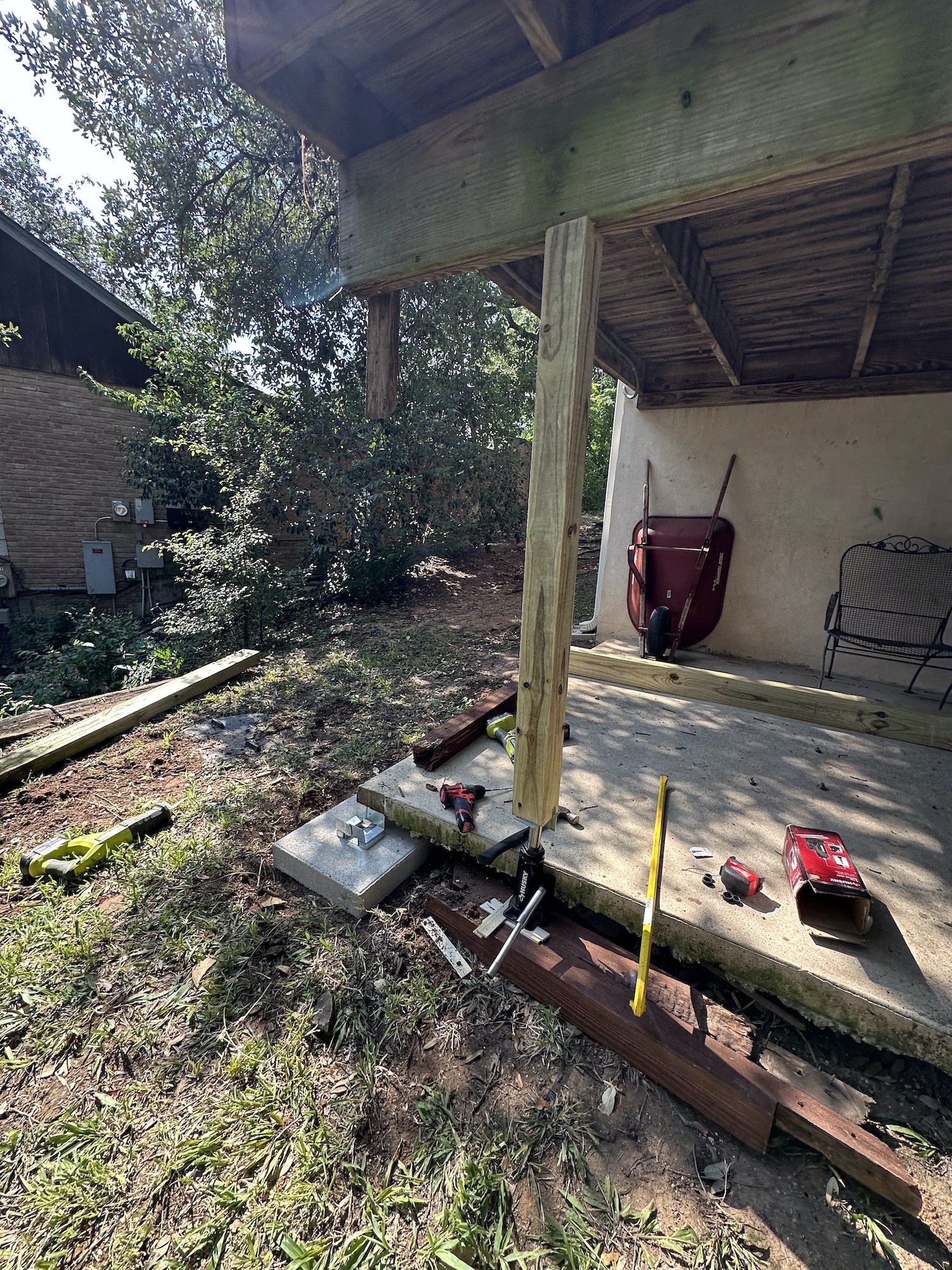 New pressure-treated 6x6 support post installed on a metal post base — Austin deck repair