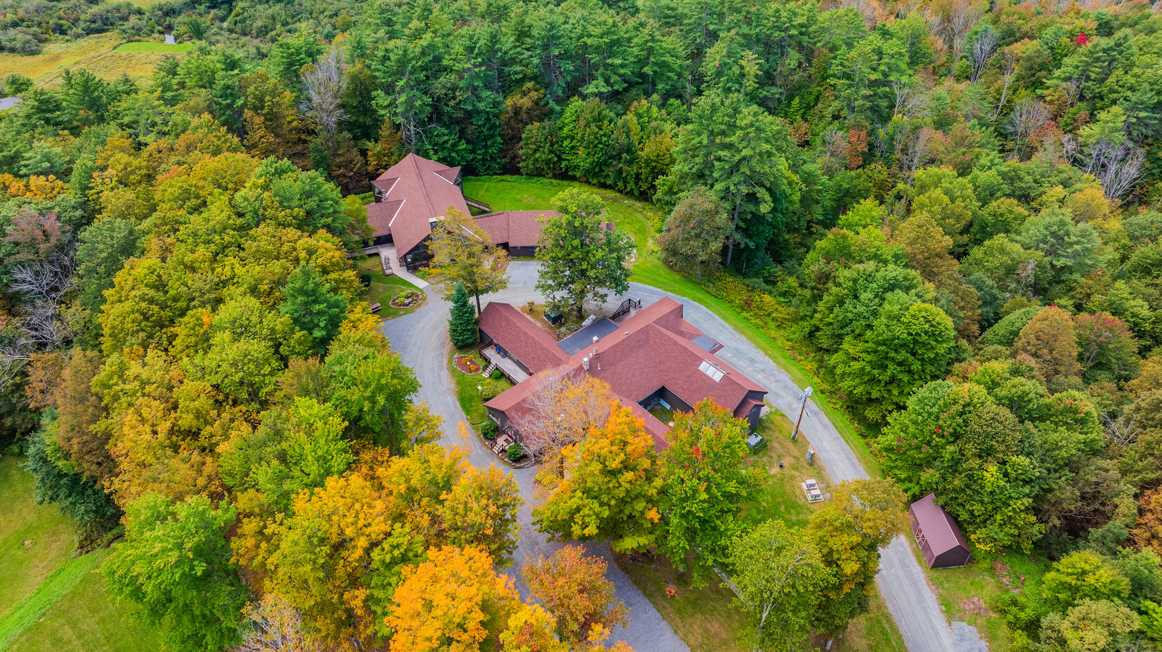 Singing Hills campus surrounded by New Hampshire woodland
