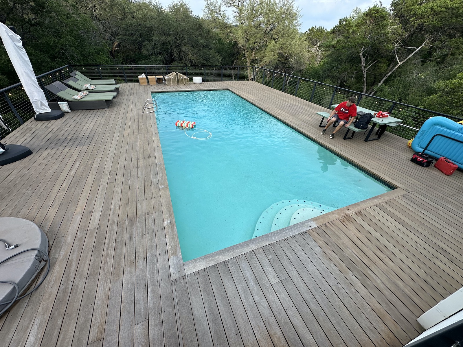 Detail of IPE deck restoration process in West Lake Hills TX