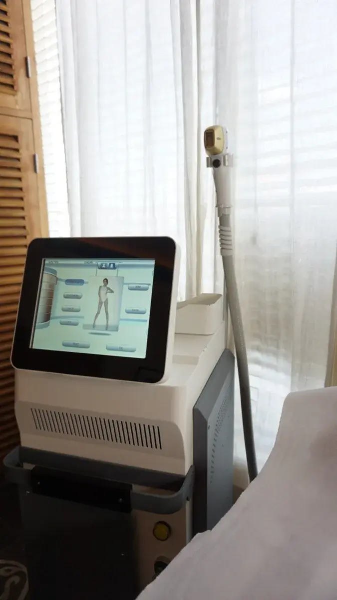 Laser machine with the treatment screen at The Silk Road studio, Seminyak