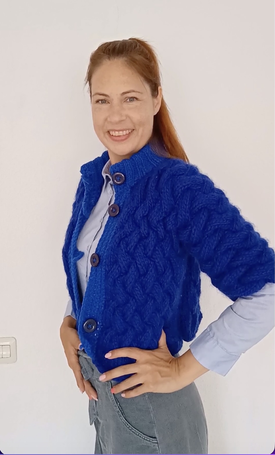 Premium hand-knitted cardigan made of organic royal blue wool