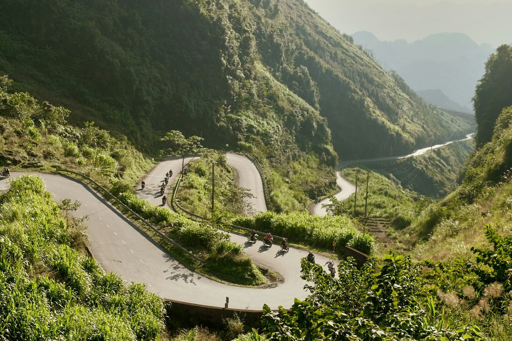 Royal Enfield Bear 650 in motion on a scenic road