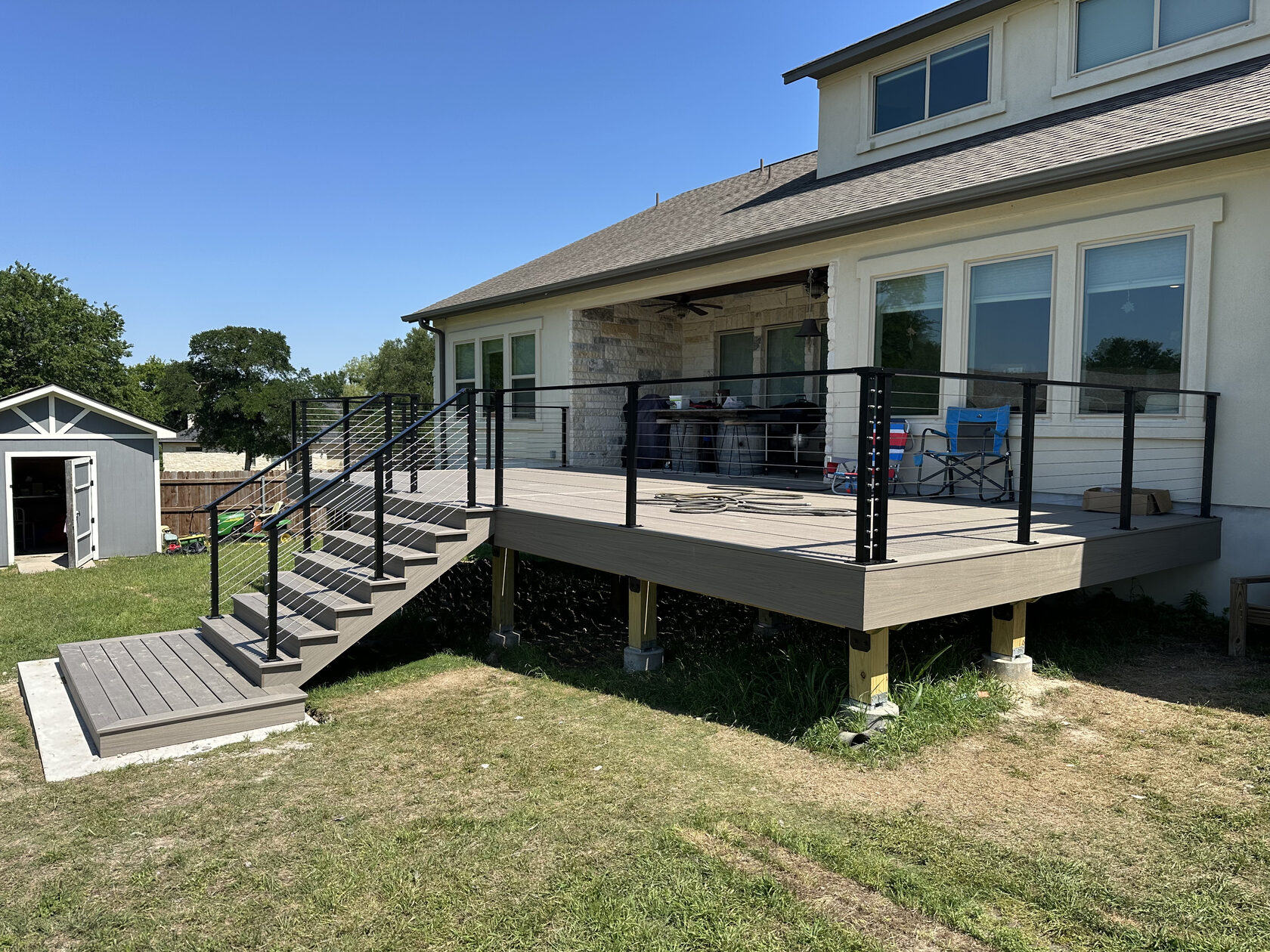 Deck rebuild with Trex composite and metal railing — ATX Deck & Patio Austin TX