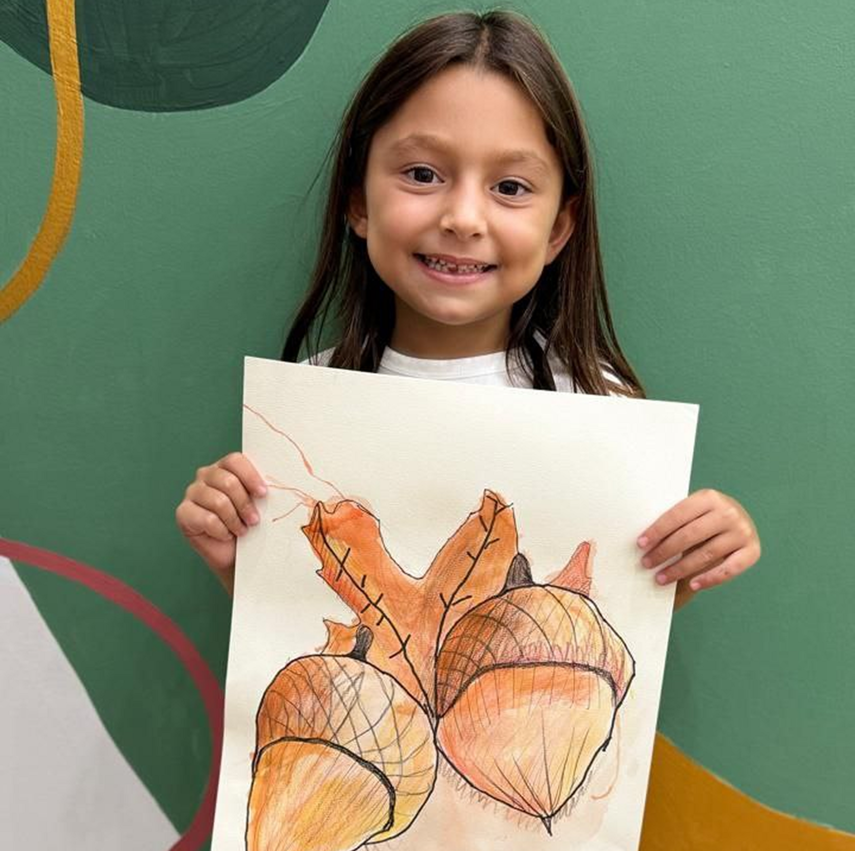 Young children exploring painting and drawing