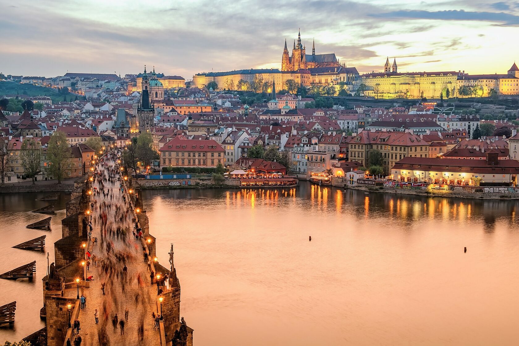 prague's charles bridge at dusk