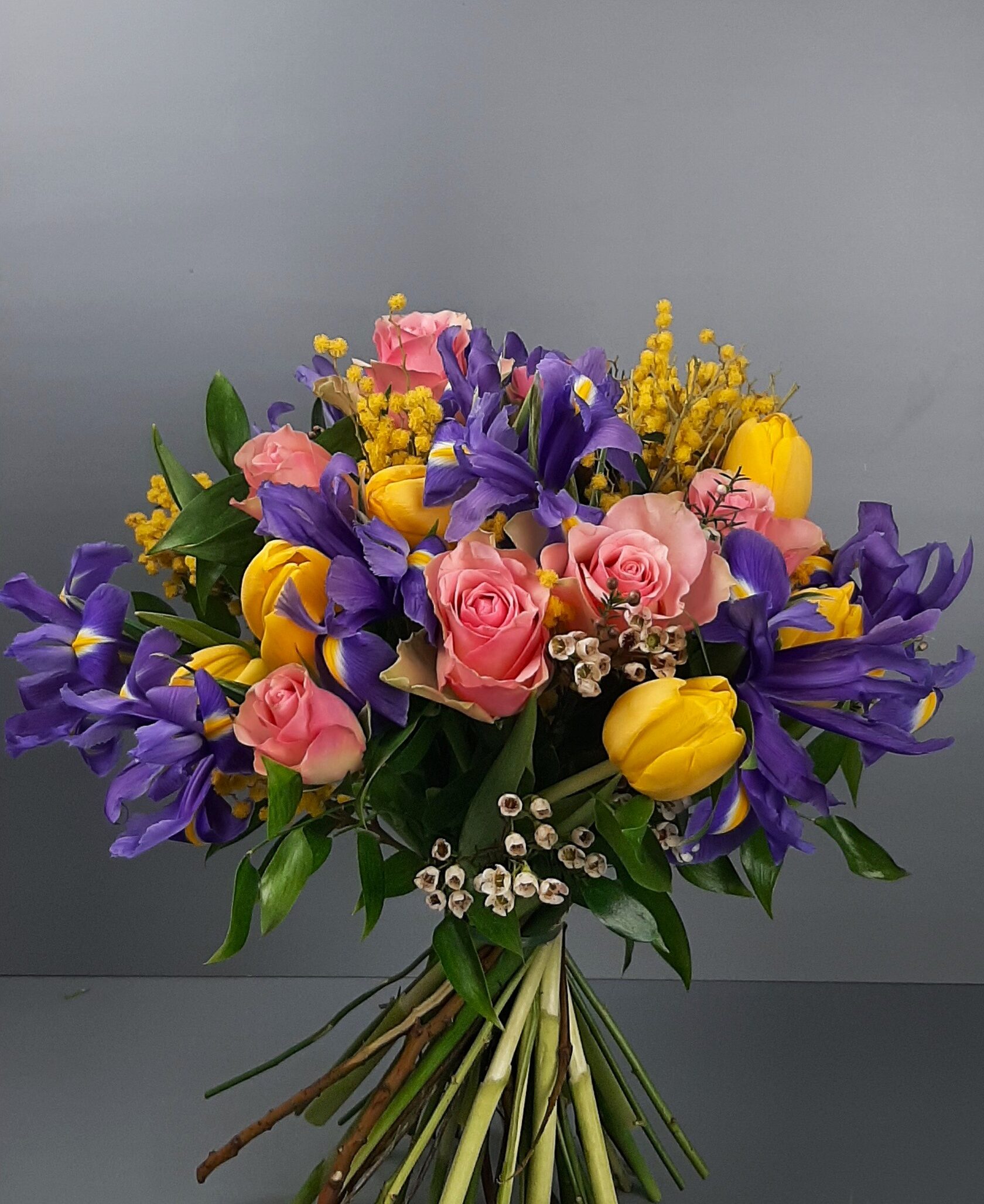 a vibrant bouquet in pink and purple tones