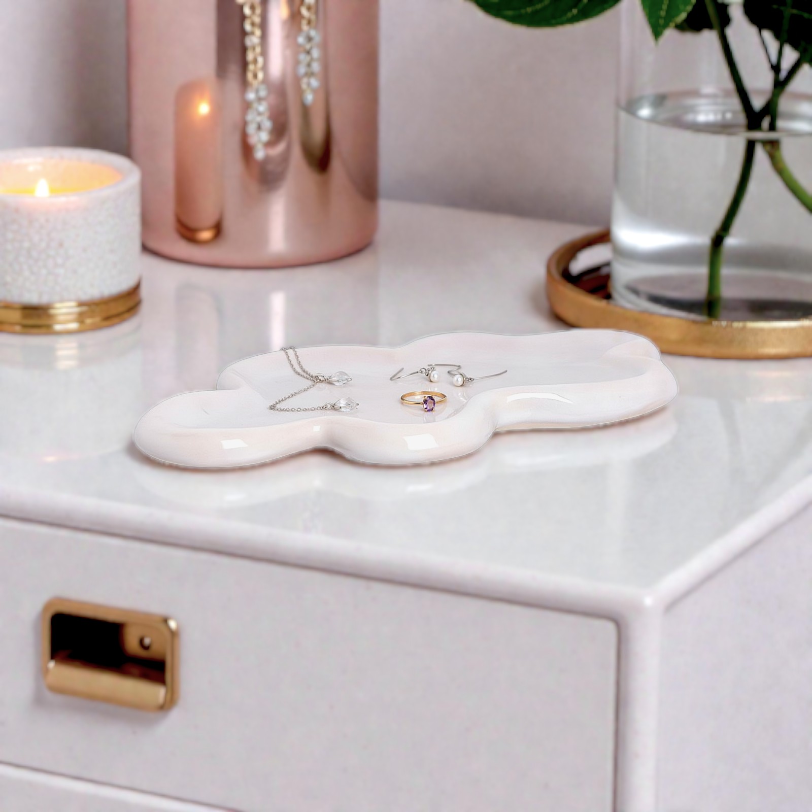 Handmade ceramic cloud-shaped tray for jewelry, elegant bedroom decor with soft lighting