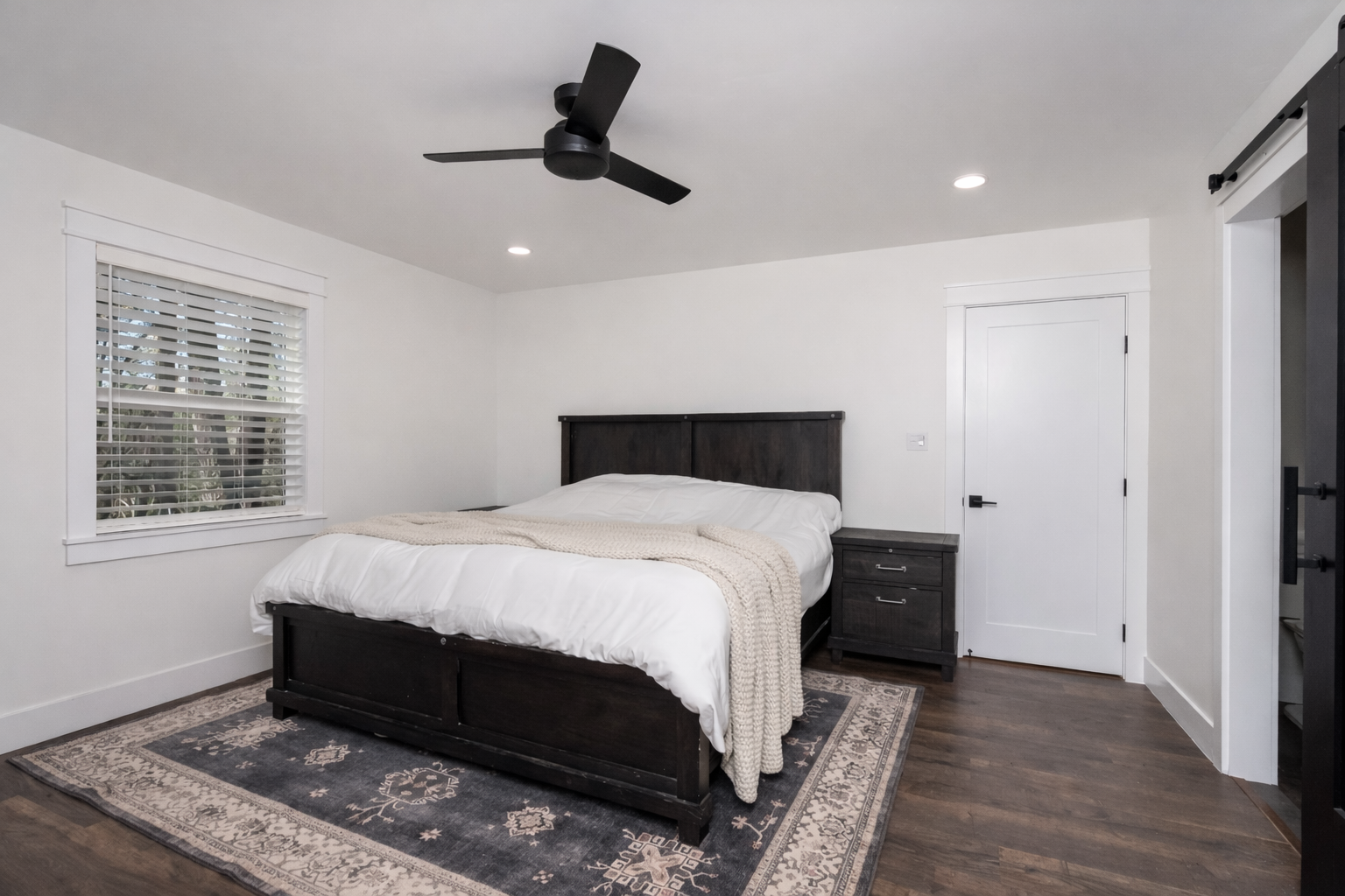 unfinished bedroom wall before renovation
