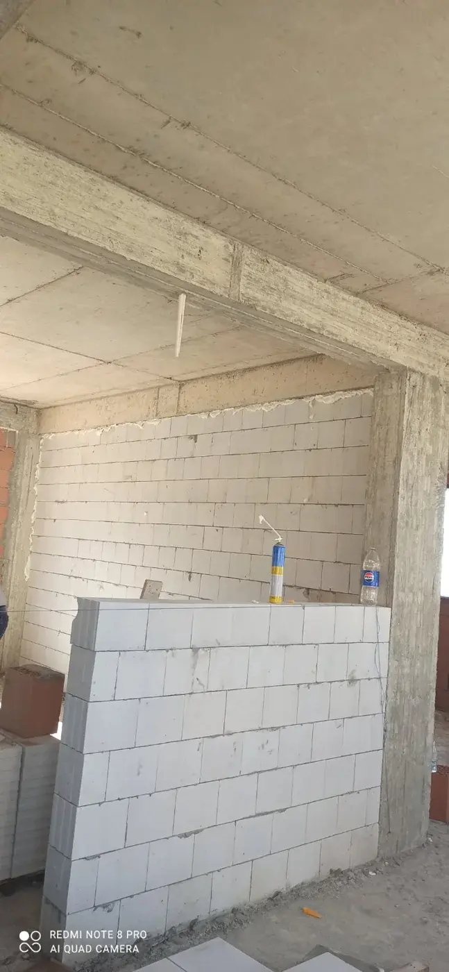 The April archive shows internal walls and a partition still being built, before the final finishes.