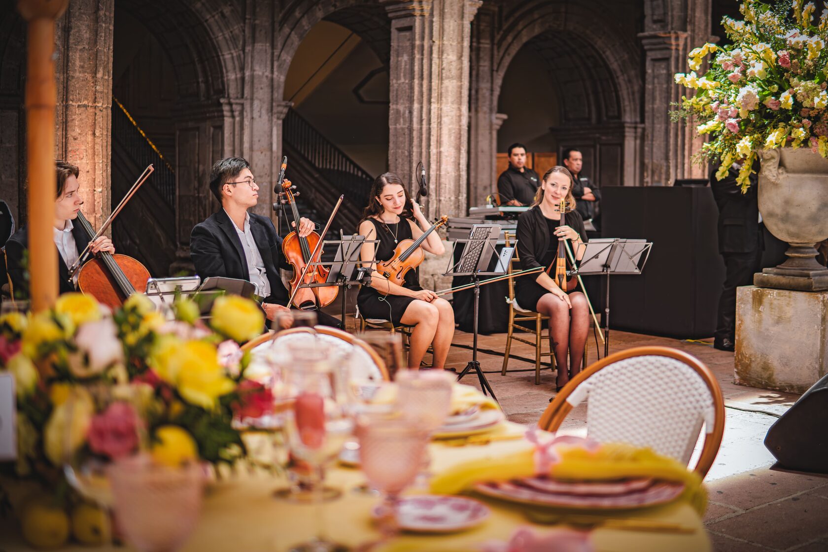 String quartet performing during a wedding cocktail hour