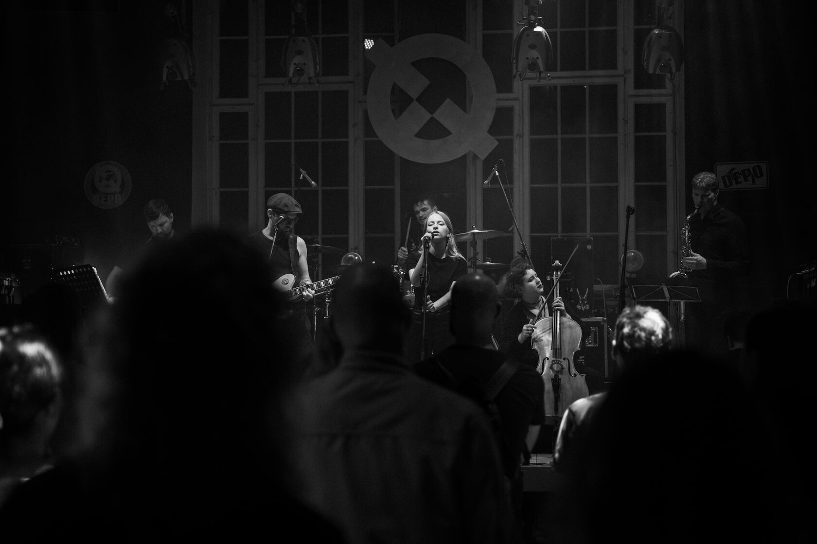 Full band performing live on stage