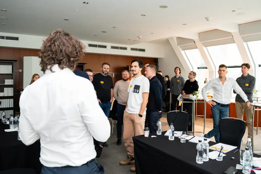 Vitaly Krylov running a session with a management team