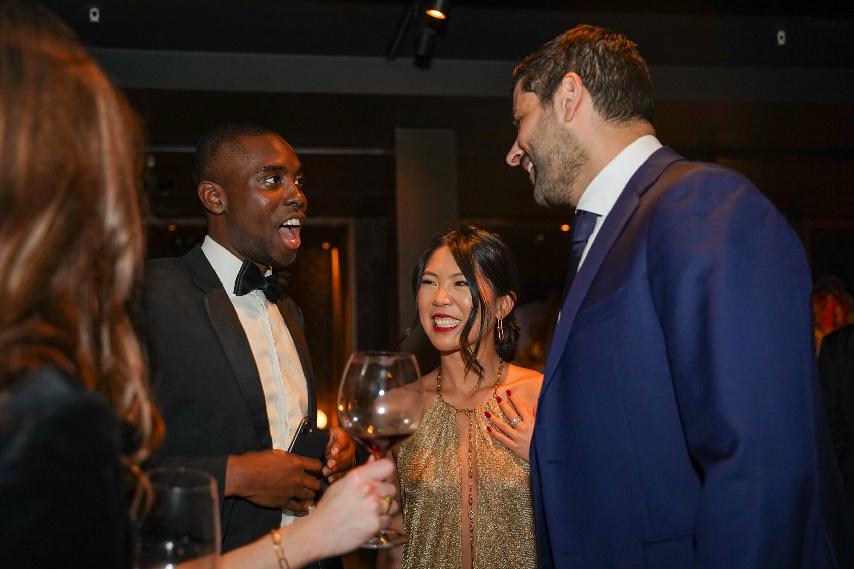 Guests sharing a conversation at a business networking reception